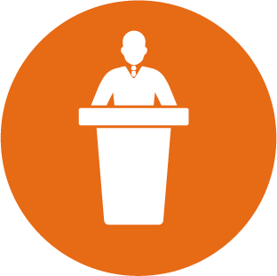 Silhouette of person standing behind a podium icon