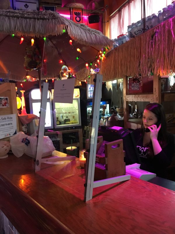 Podium Pros Sneeze Shield at Wild Wing service counter