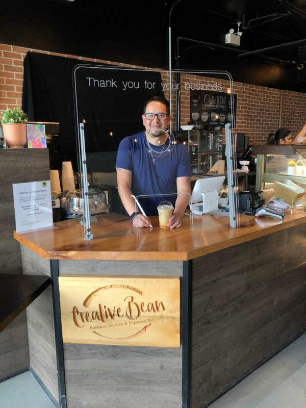 Podium Pros Sneeze Shield at Creative Bean service counter