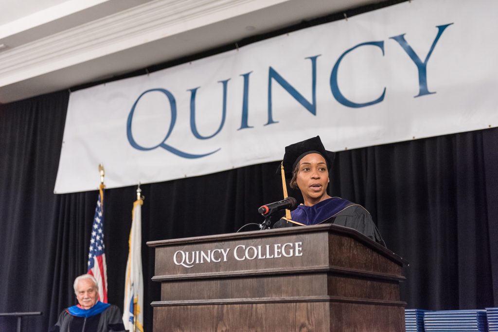 Quincy College graduation ceremony using a Podium Pros podium.
